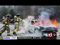 Fire crews battle flames in car fire