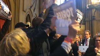 'Tories out!' Protesters disrupt Jacob Rees-Mogg meeting – video