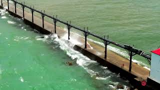 Kids Almost Swept Off Lighthouse Pier Heart Stopping, being hit with huge waves drone footage