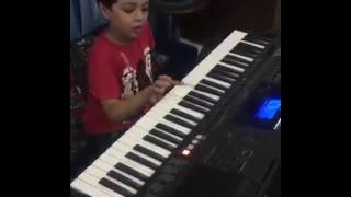 Pehlaj Hassan trying to play piano