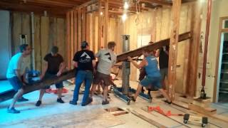 Installation of large steel beam during kitchen remodeling