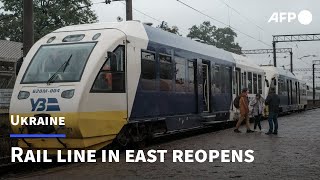 Defiant Ukraine reopens eastern rail link despite missiles | AFP