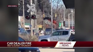 Car dealership catches fire in Waukesha