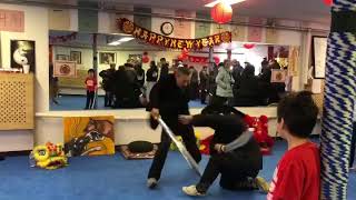 Two handed jian (master Wang Rengang) vs Brian and I (Chinese broadsword)