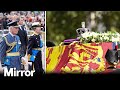 The Queen's coffin leaves Buckingham Palace in a procession to Westminster Hall