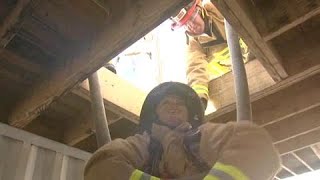Removing a Down Firefighter Using a Hoseline