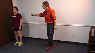 Rolfing Exercises Strengthen Your Core and Legs Using a Thera Band in a Simple Exercise