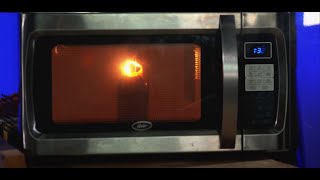 Danger! Melting A Beer Bottle With A Microwave!