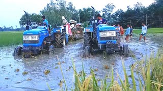 দুইটি সোনালিকা ট্রাক্টর গাড়ি যখন এক সাথে অন্য গাড়ি টানার কাজে ব্যবহার করে।।