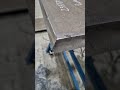 degaussing of a steel plate to eliminate magnetic adhesion of steel dust