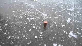 The Original Spinning Bullet - 9mm Spins on Ice