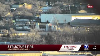 Crews battle structure fire near Carter Lake neighborhood