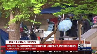 Protesters flee PSU library as police surround building
