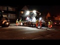 Late night heavy machinery in the street. Road resurfacing Loughton, UK Late night heavy machinery in the street. Road resurfacing Loughton, UK