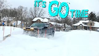 Trucks Plowing deep snow