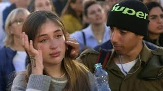 Supporters and relatives of hostages watch broadcast of their release in Tel Aviv | AFP