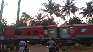 Level crossing in India railways | Chennai Mail in Kottayam with WAP 7 at good speed