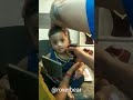 Ear piercing of a 2 years old child