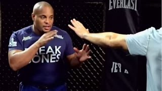 Daniel Cormier demonstrates plan to deal with height \u0026 reach of Jon Jones