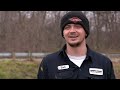 man delivers fedex packages left on the side of a highway