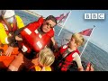 Racing against time to save a family stranded at sea 😲 BBC