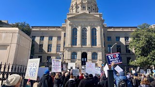 Demonstrators protest Trump administration at Georgia Capitol on Presidents’ Day