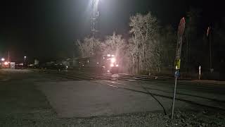 CSX M372 heads eastbound past Abrams Yard