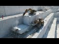 wheel loaders caterpillar 992d and komatsu wa900 working on birros marble quarries