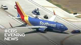 Flight cancellations and delays cause holiday travel woes