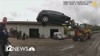 Ohio auto shop employees use forklift to stop a car thief in mid-air