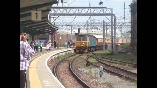 The LSL Class 47 BR Blue No.47614 with ‘LSL Saphos Trains’ are Empty Coaches approaches at Carlisle.