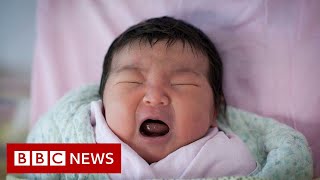 China's population grows at slowest pace in decades - BBC News