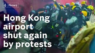 Hong Kong: Violent clashes paralyse airport for second day