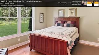 6997 S West Bayshore Dr | Laurie Bouwman