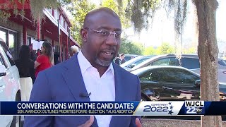 Incumbent Senator Raphael Warnock slams his challenger's stance on abortion and highlights his ow...