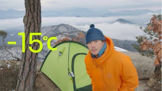 Overnight winter backpacking in a small mountain above -15 clouds