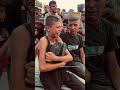 palestinian boy holds shoes of killed father ajshorts