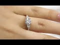 1.30ct centre round brilliant cur diamond with side pear tr1092