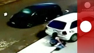 Shocking CCTV: Miracle escape for kid and grandmother run over by car