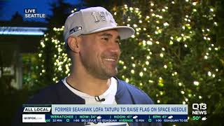 Former Seahawk Lofa Tatupu to raise flag on the Space Needle