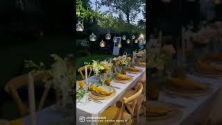 Dinner party table setup. Tablescape in the backyard.