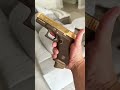 GLOCK 19X CUSTOM 24K GOLD PLATED HIGH POLISHED SLIDE. FULL STIPPLE GRIP AND CERAKOTE FRAME. 9MM