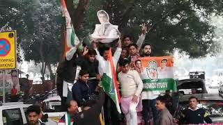 Congress supporters celebrate at AICC office in New Delhi on Tuesday. Tribune Photo: Mukesh Aggarwal