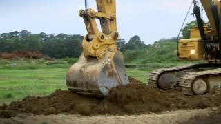 Cat® 326F Hydraulic Excavator at Work Fine Grading