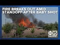 Fire breaks out amid standoff after 7-month-old shot several times in Surprise neighborhood