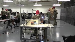 Parachute riggers employ unique sewing skills to protect the force