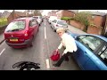 motorcycle hits pedestrian old lady walks through traffic