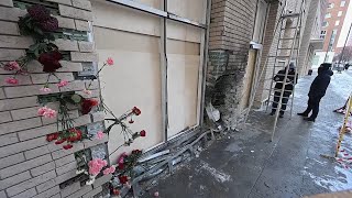 People bring flowers to Kirillov blast site in Moscow