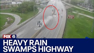 Lane swamped by heavy rain, leads to crash | FOX6 News Milwaukee