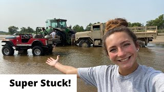 Rescuing Stuck Military Truck with John Deere 8330